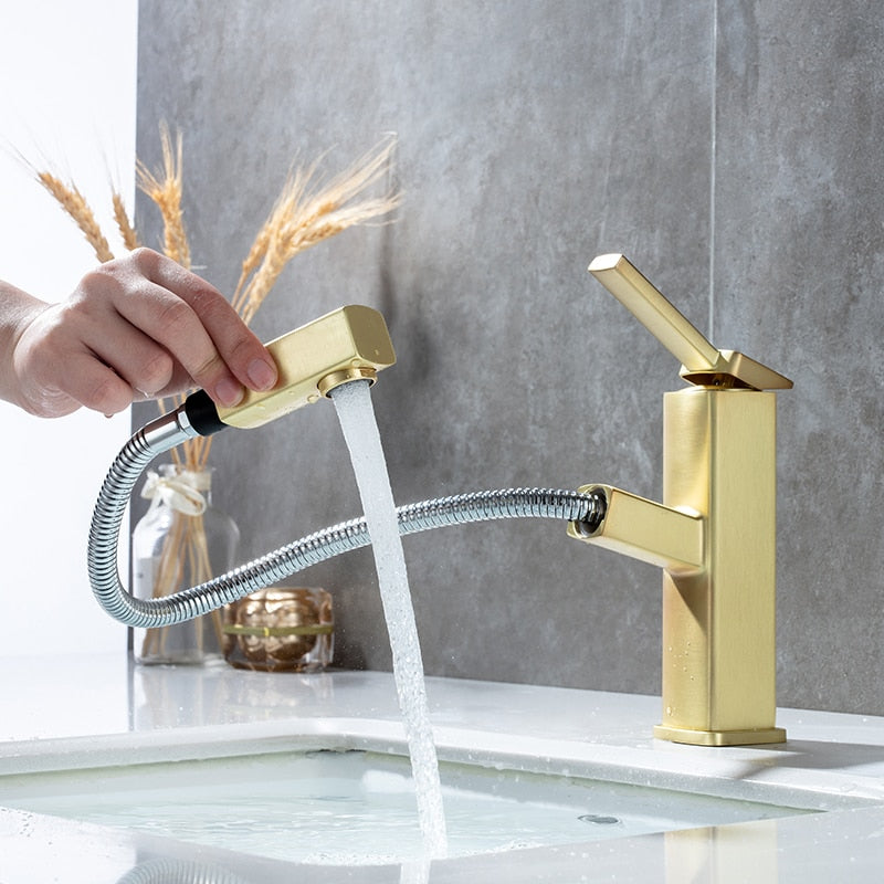 Gold bathroom faucet with pull out sprayer